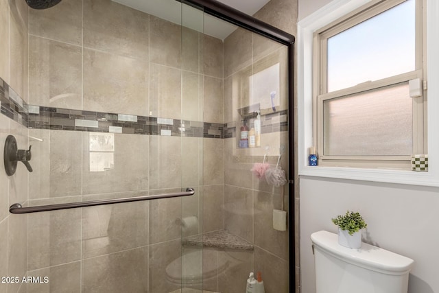 8807 E Dahlia Dr, Scottsdale, AZ 85260 - bathroom featuring toilet and a stall shower