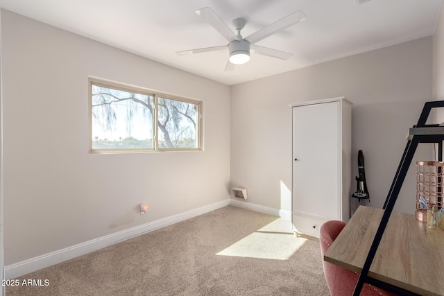 8807 E Dahlia Dr, Scottsdale, AZ 85260 - office featuring visible vents, baseboards, carpet, and a ceiling fan