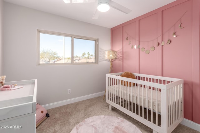 8807 E Dahlia Dr, Scottsdale, AZ 85260 - bedroom with a nursery area, baseboards, carpet, and a ceiling fan