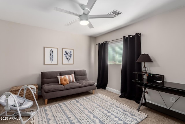 8807 E Dahlia Dr, Scottsdale, AZ 85260 - living room with visible vents, light carpet, baseboards, and a ceiling fan