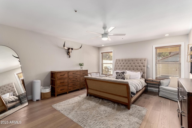 8807 E Dahlia Dr, Scottsdale, AZ 85260 - bedroom featuring recessed lighting, light wood-style flooring, and ceiling fan