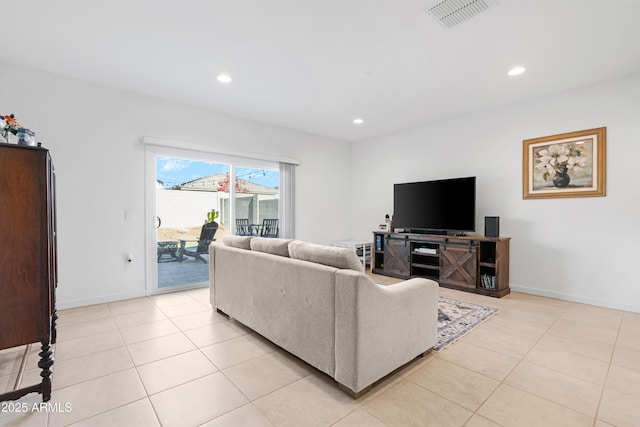 living room with light tile patterned floors