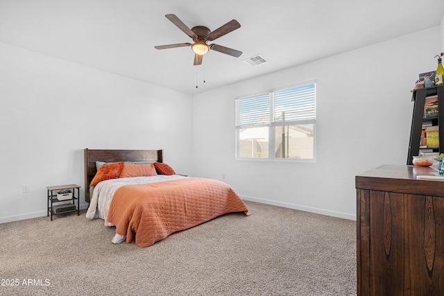 bedroom with light carpet and ceiling fan