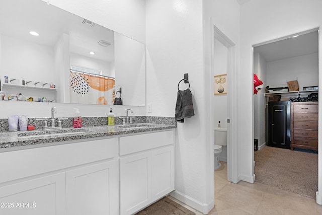 bathroom with tile patterned floors, vanity, toilet, and a shower with shower curtain