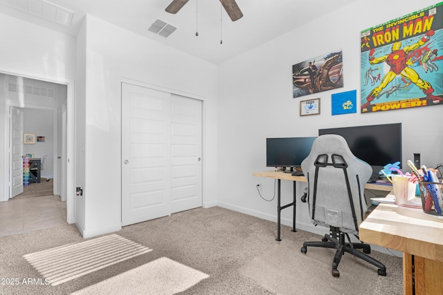 office space featuring carpet floors and ceiling fan