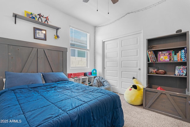 bedroom featuring carpet flooring, ceiling fan, and a closet