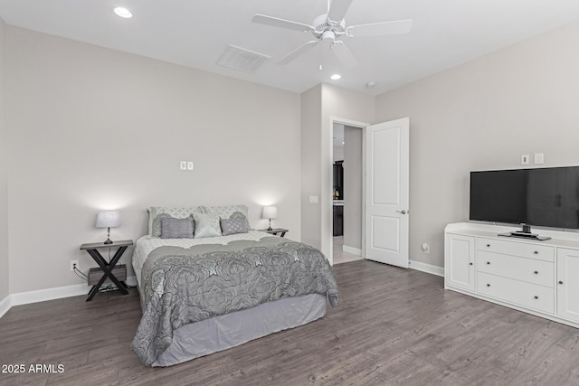 bedroom with ceiling fan and dark wood-type flooring