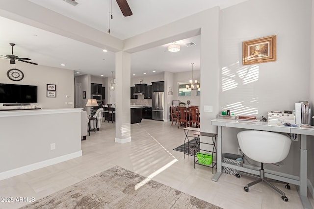 office area featuring ceiling fan with notable chandelier and light tile patterned floors