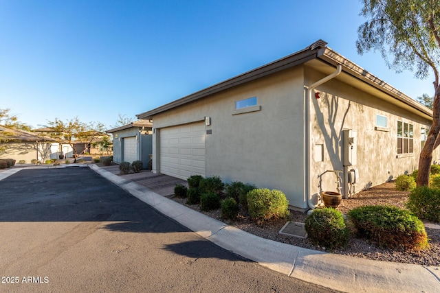 view of home's exterior with a garage