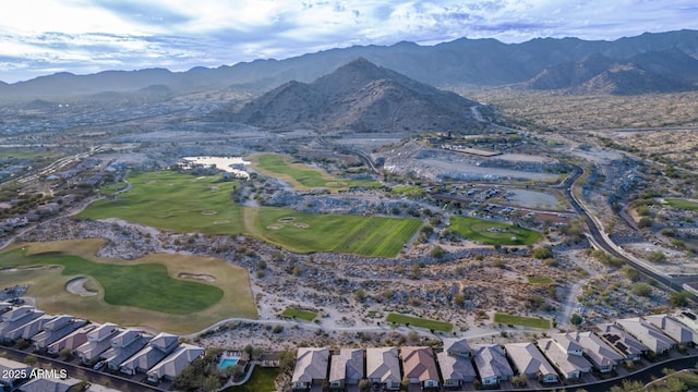 birds eye view of property featuring a mountain view