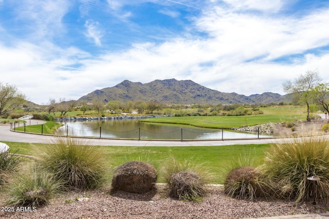 view of mountain feature featuring a water view