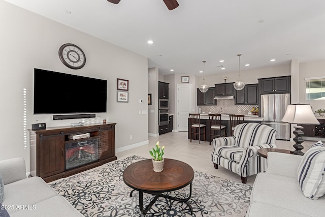 living room with ceiling fan