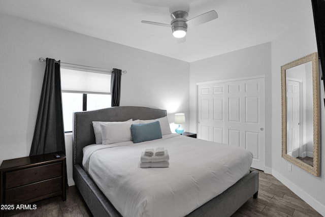 bedroom with ceiling fan and a closet