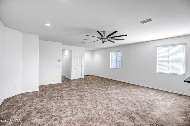 spare room with baseboards, visible vents, a ceiling fan, and recessed lighting