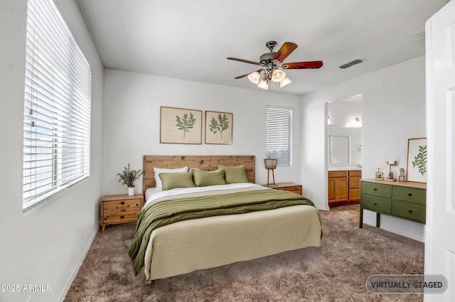 bedroom featuring visible vents, baseboards, a ceiling fan, connected bathroom, and carpet