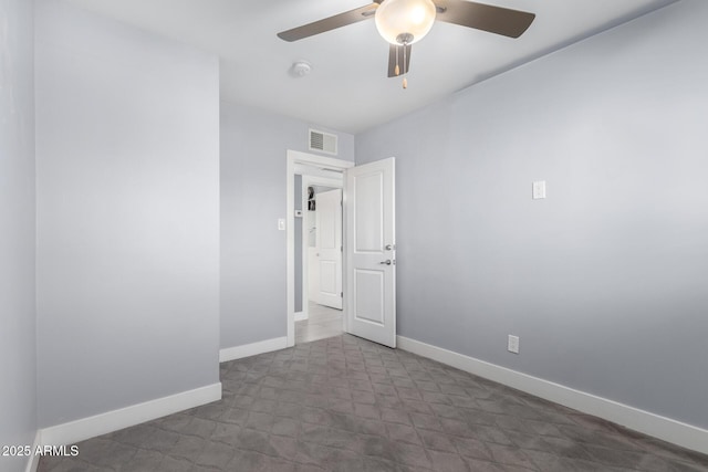 empty room featuring ceiling fan