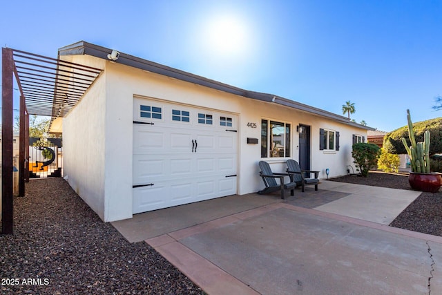 single story home featuring a garage