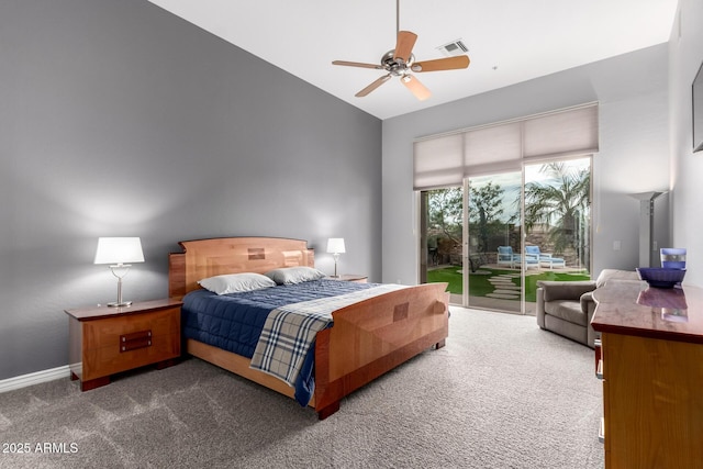 carpeted bedroom with ceiling fan, access to outside, and vaulted ceiling