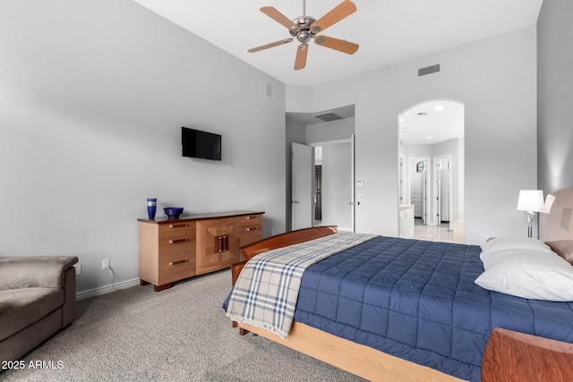 bedroom with ceiling fan and light colored carpet