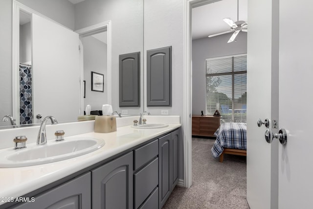 bathroom with ceiling fan and vanity