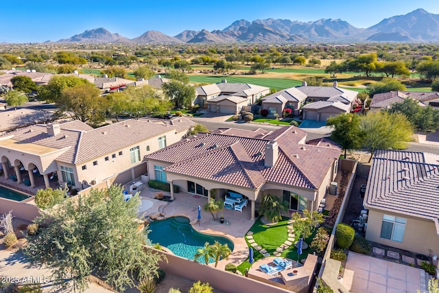 drone / aerial view featuring a mountain view