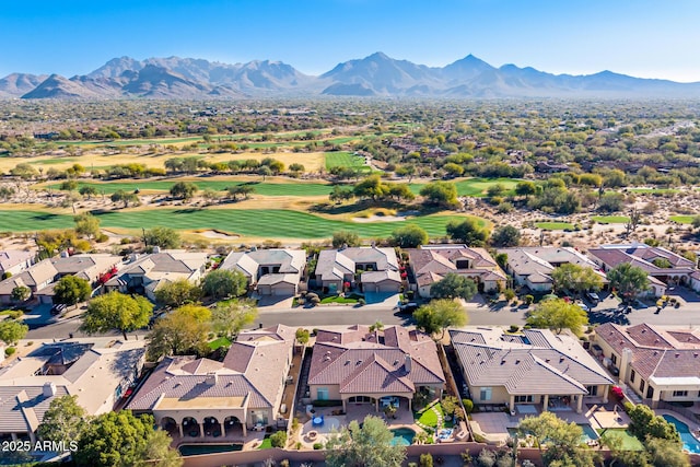 birds eye view of property featuring a mountain view