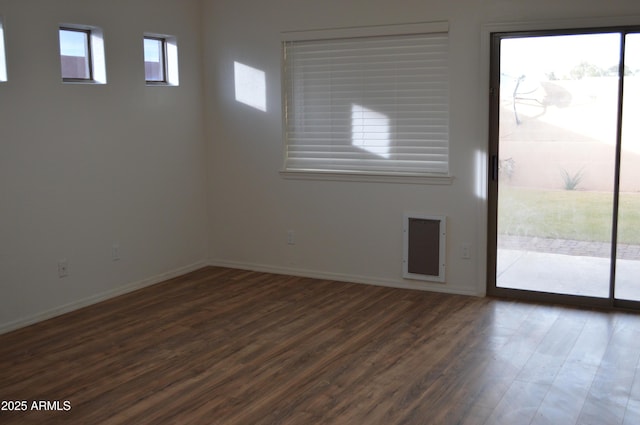 6620 W Shaw Butte Dr, Glendale, AZ 85304 - unfurnished room with dark wood-style flooring and baseboards