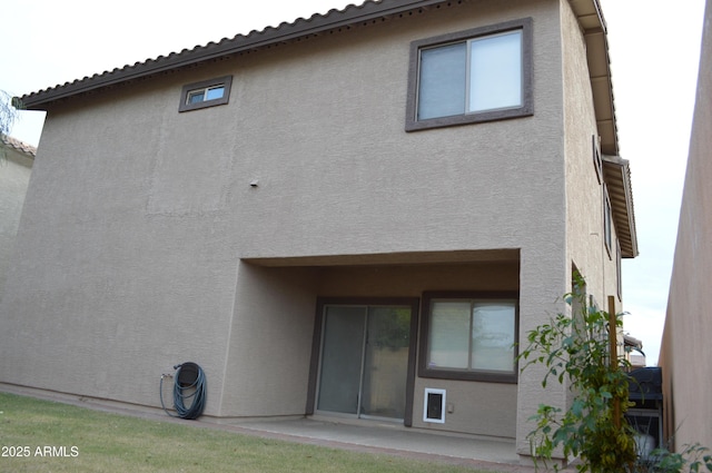 6620 W Shaw Butte Dr, Glendale, AZ 85304 - back of property with stucco siding and a patio area