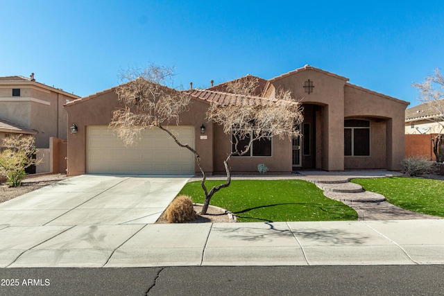 view of front of house featuring a garage and a front yard