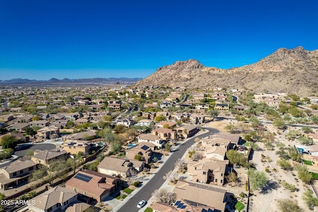 bird's eye view with a mountain view