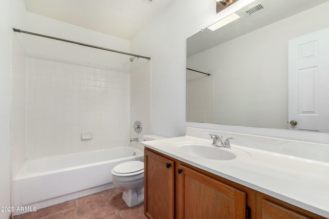 full bathroom with tile patterned floors, bathing tub / shower combination, vanity, and toilet