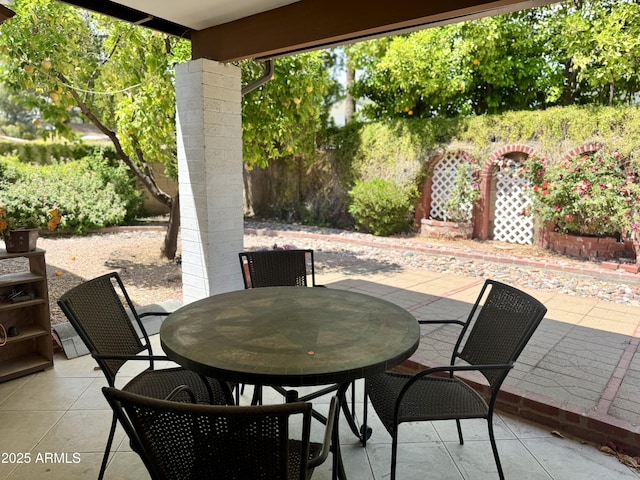 8552 E Via Del Palacio, Scottsdale, AZ 85258 - view of patio / terrace featuring a fenced backyard and outdoor dining area