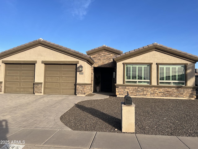 view of front of property featuring a garage