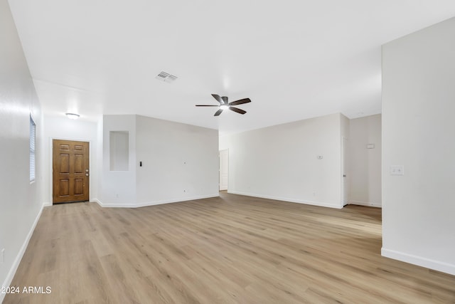 unfurnished room featuring ceiling fan and light hardwood / wood-style floors