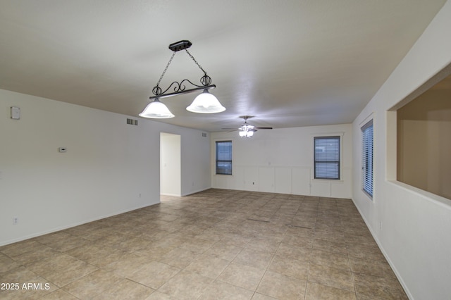 empty room with ceiling fan