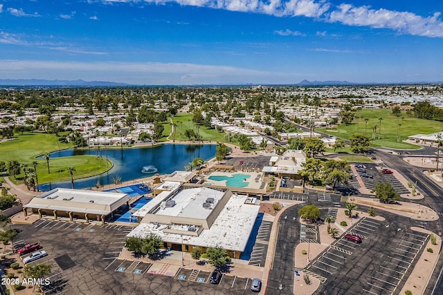 bird's eye view with golf course view and a water view