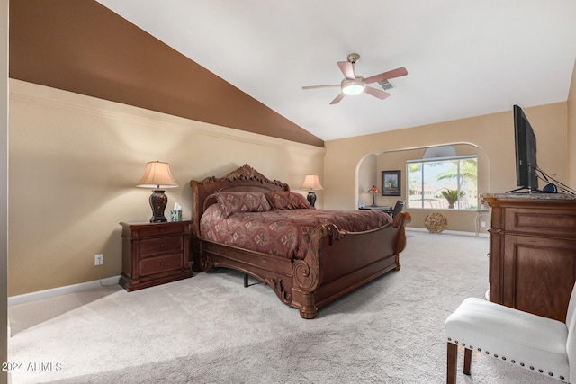 carpeted bedroom featuring ceiling fan and lofted ceiling