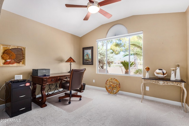 office area featuring lofted ceiling, ceiling fan, and carpet flooring