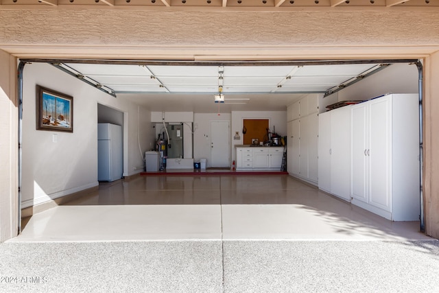 garage with fridge and white refrigerator