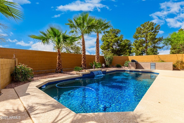 view of swimming pool featuring a fenced in pool, a patio, and a fenced backyard