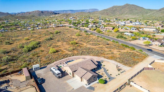 drone / aerial view featuring a mountain view