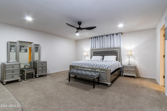 carpeted bedroom featuring ceiling fan