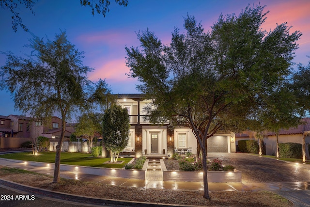 view of front of home with a garage