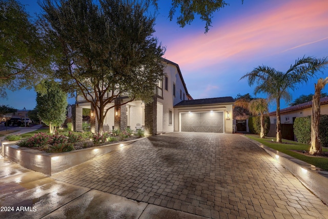 view of front of property featuring a garage