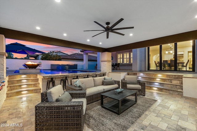 living room featuring ceiling fan