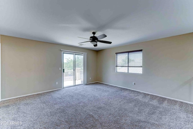10524 W Pima St, Tolleson, AZ 85353 - empty room featuring healthy amount of natural light, carpet floors, and ceiling fan