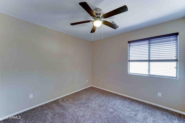 10524 W Pima St, Tolleson, AZ 85353 - carpeted spare room featuring ceiling fan and baseboards