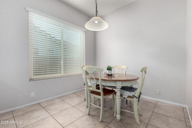 view of tiled dining space