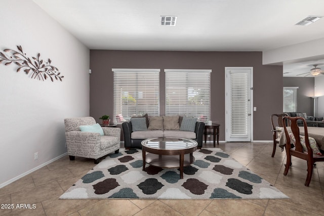 living room featuring ceiling fan