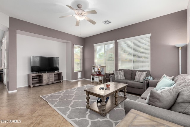 living room with ceiling fan